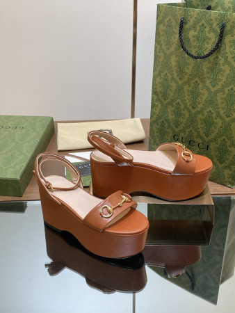 ua G*u*i women's horsebit flatform sandal