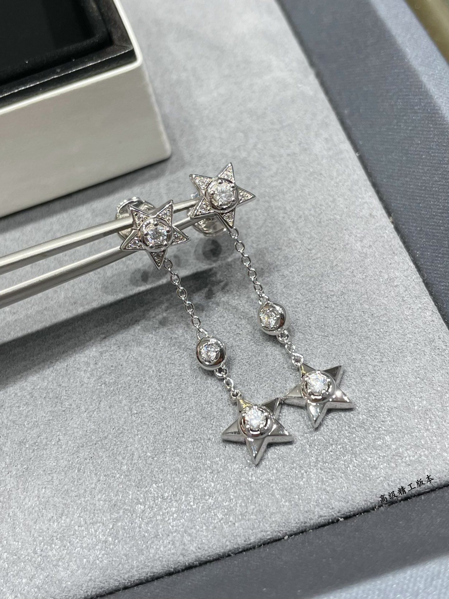 Ch*el hanging chain star earrings