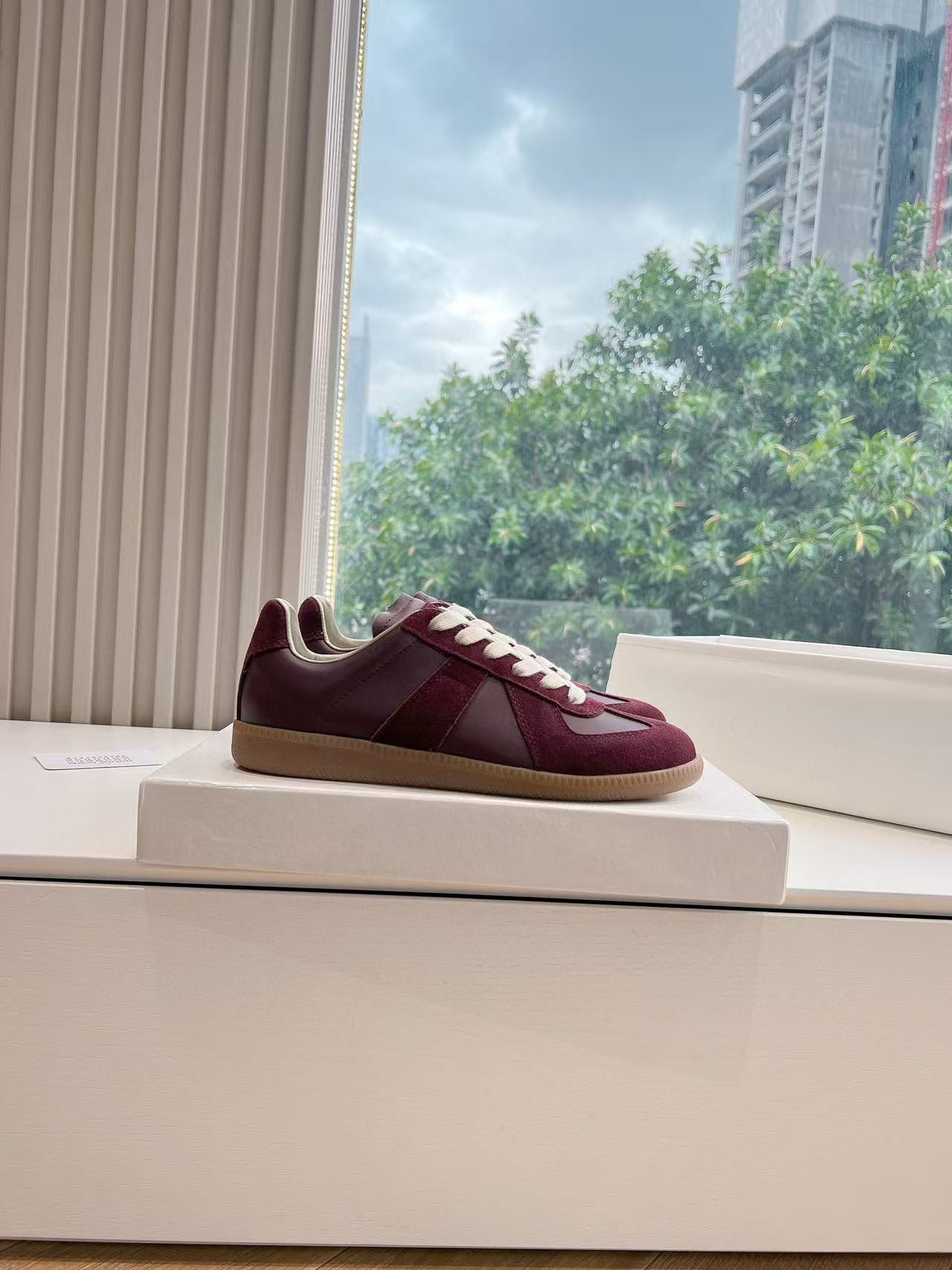 ua ma*s*n Ma*i*la mm6 sneakers