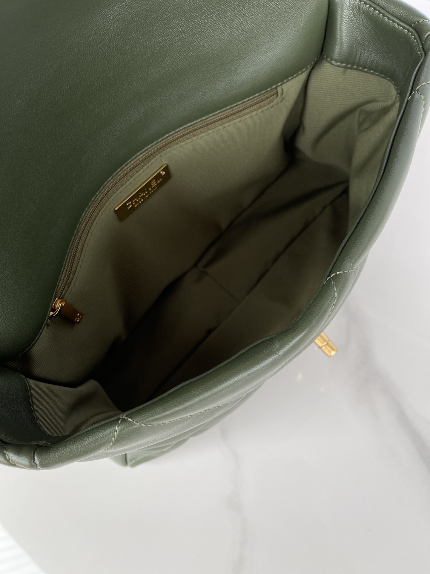 Ch*el 19 large handbag shiny leather, gold-tone, silver-tone & ruthenium-finish metal dark green 7.8 × 11.7 × 3.9 in