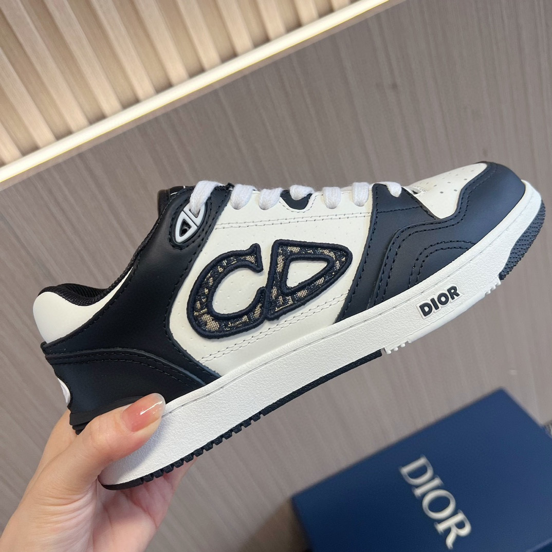 ua D*or b57 low-top sneaker black and white