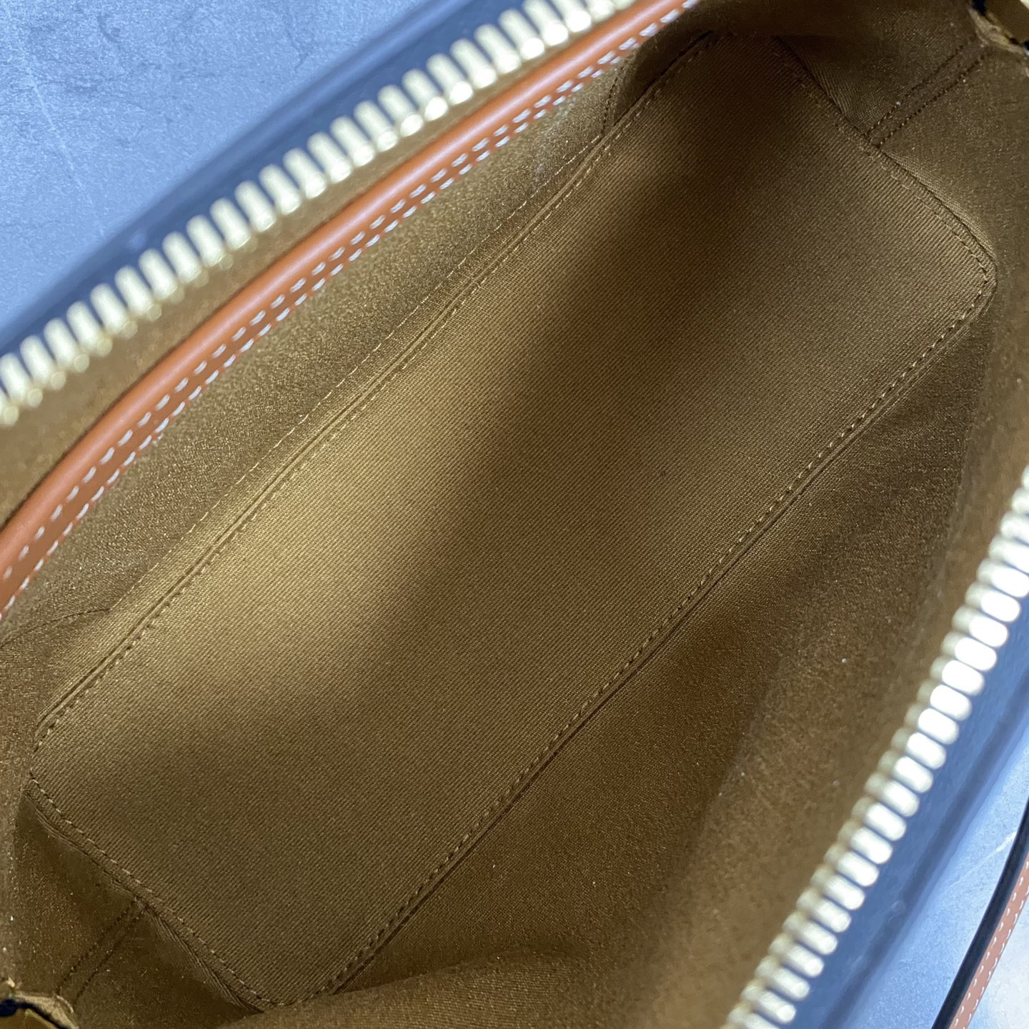 Ce**e small bowling in triomphe canvas and calfskin 25x17x10cm